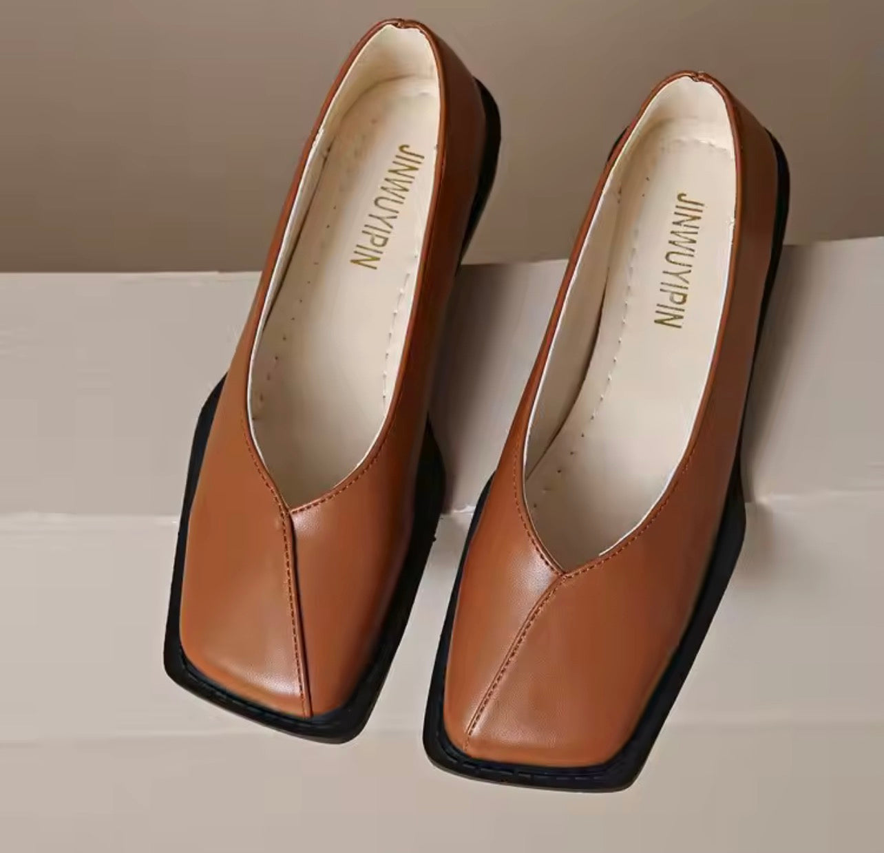 Square toe Mary Jane style shoes