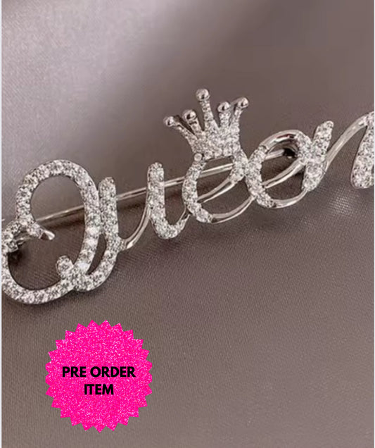 Queen brooches