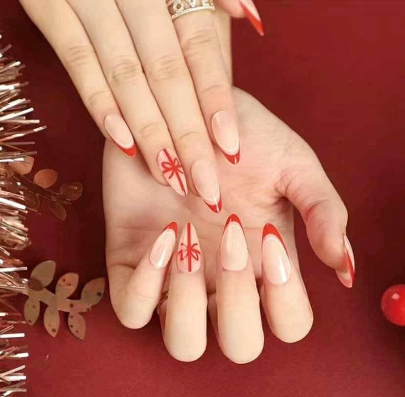 Christmas themed French manicure style press on nails.