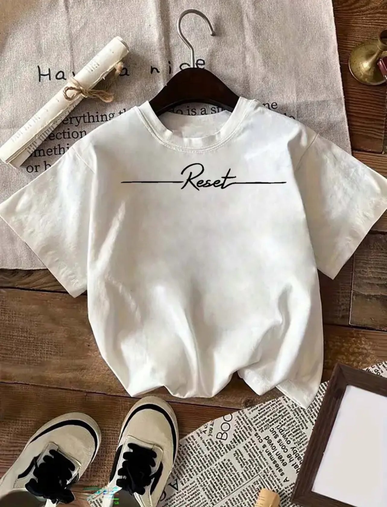 ‘RESET’ tees