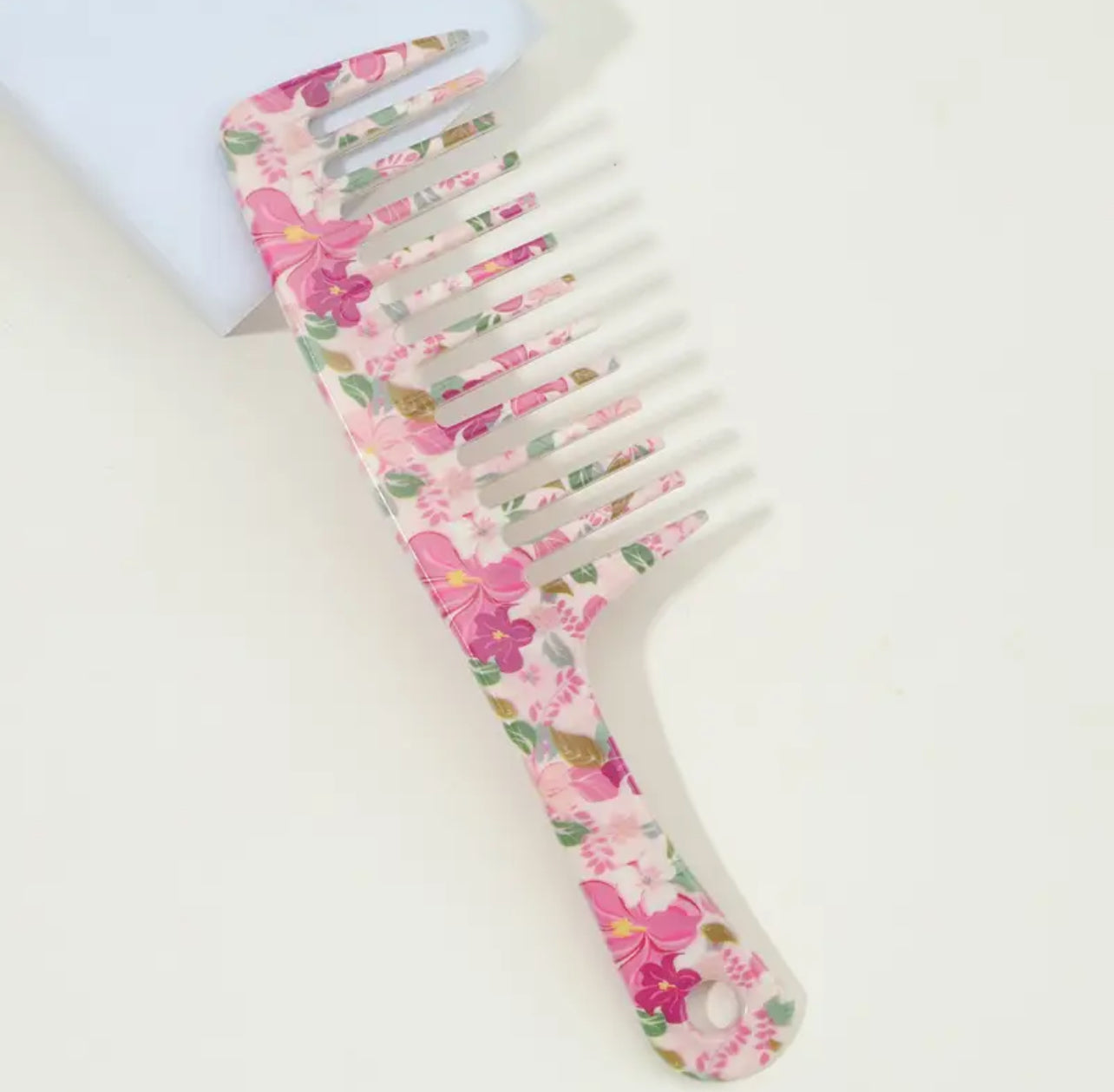 Floral design comb