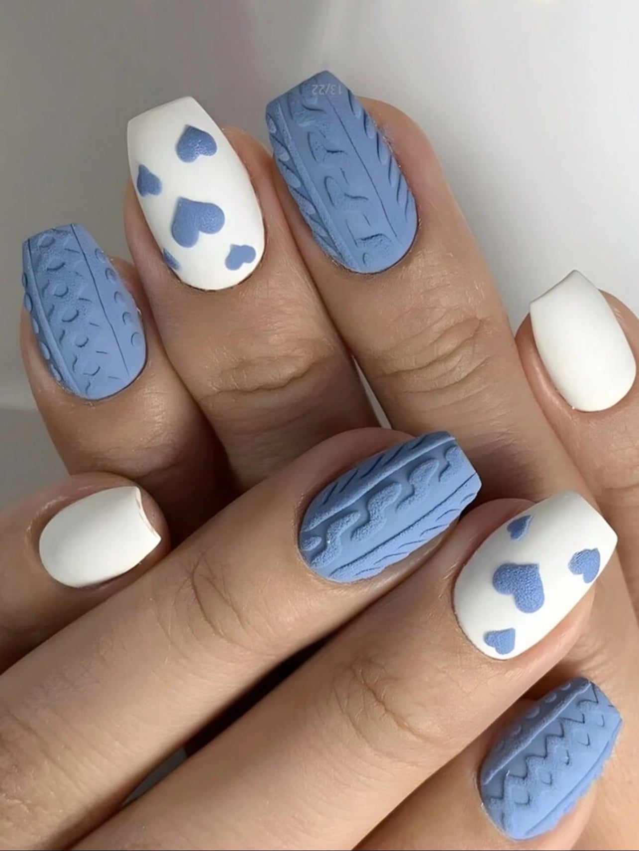 Blue patterns with heart shaped design press on nails