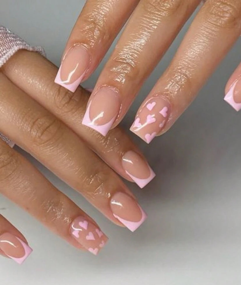 French manicure in pink style with heart shaped design press on nails