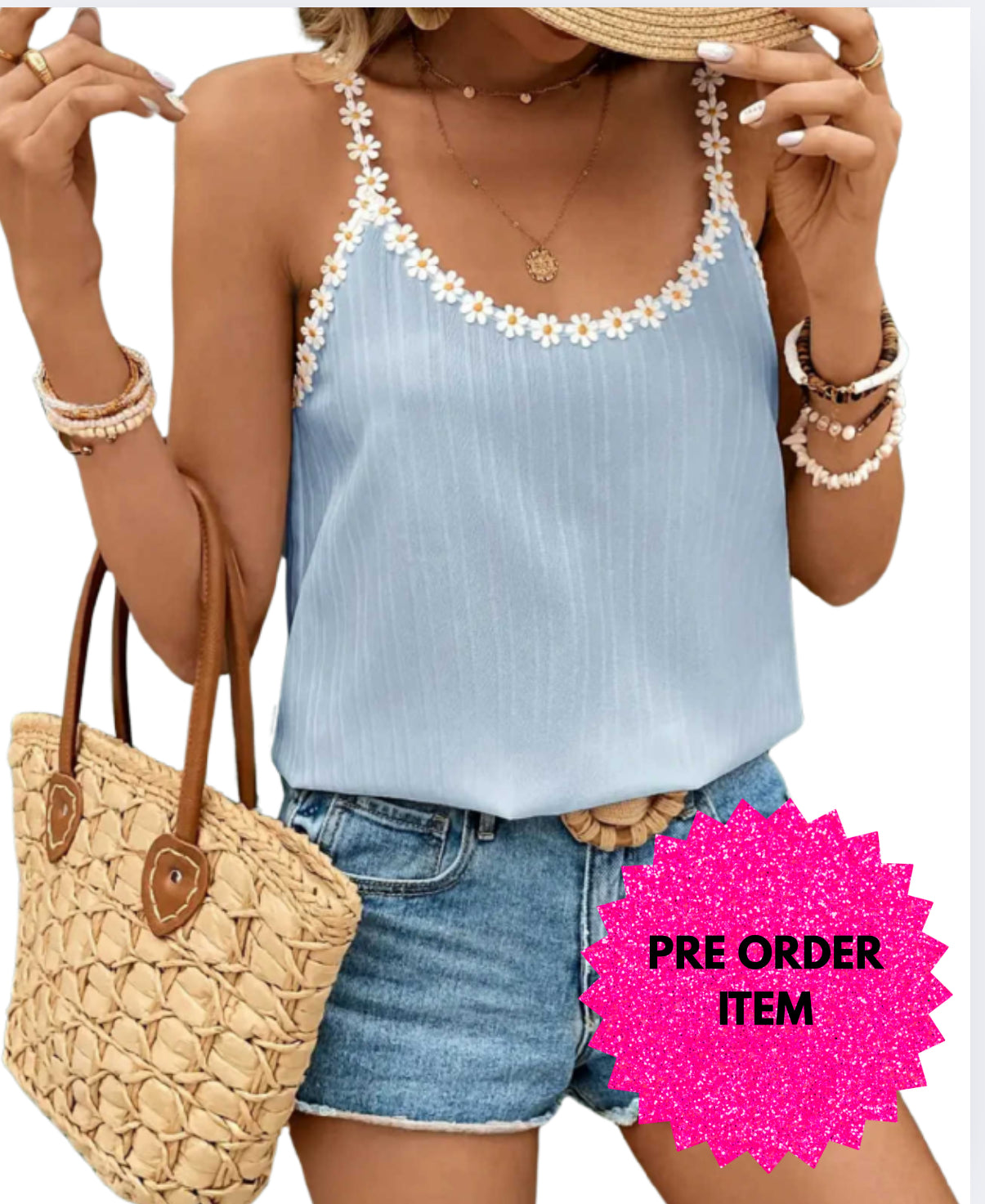 Baby blue top with sunflower patterns