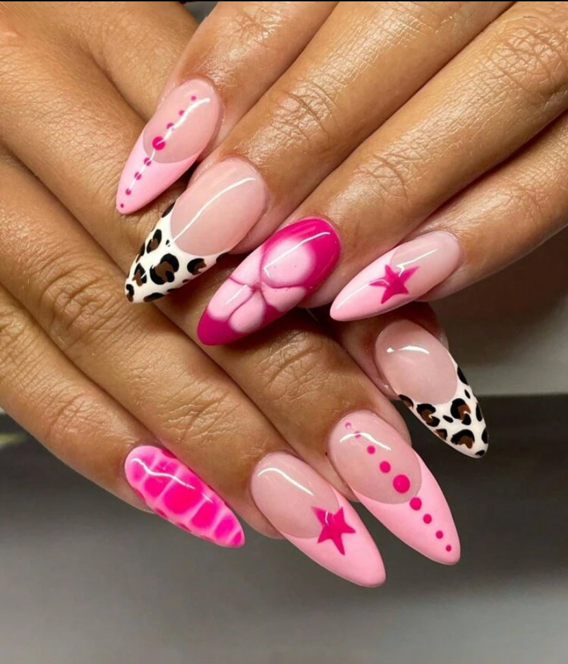 French manicure style with leopard , star, and flowers shaped almond shaped press on nails