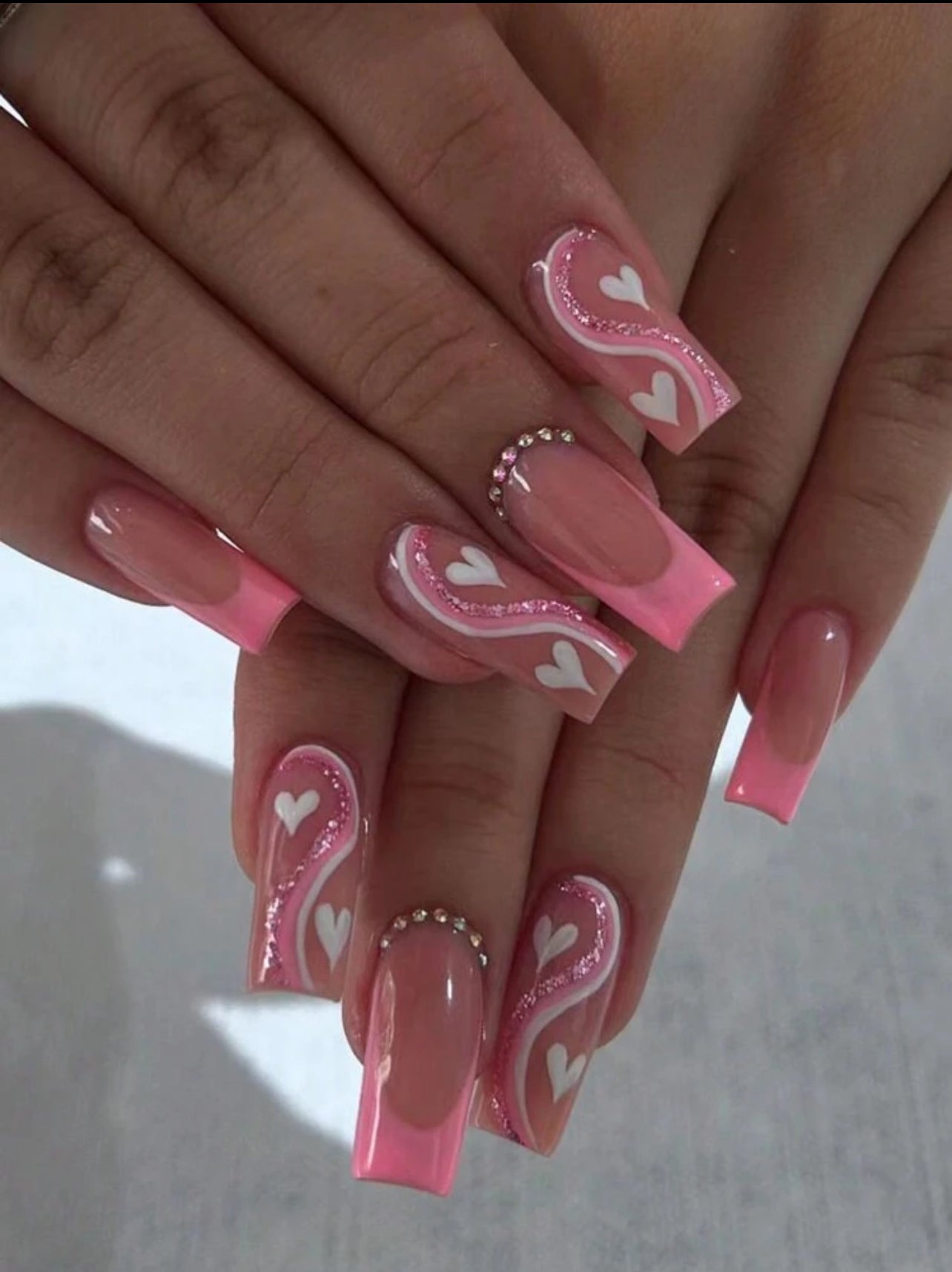 Pink french tips style with heart printed and rhinestones press on nails