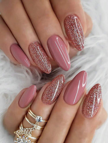 Nude and glittery oval shaped press on nails