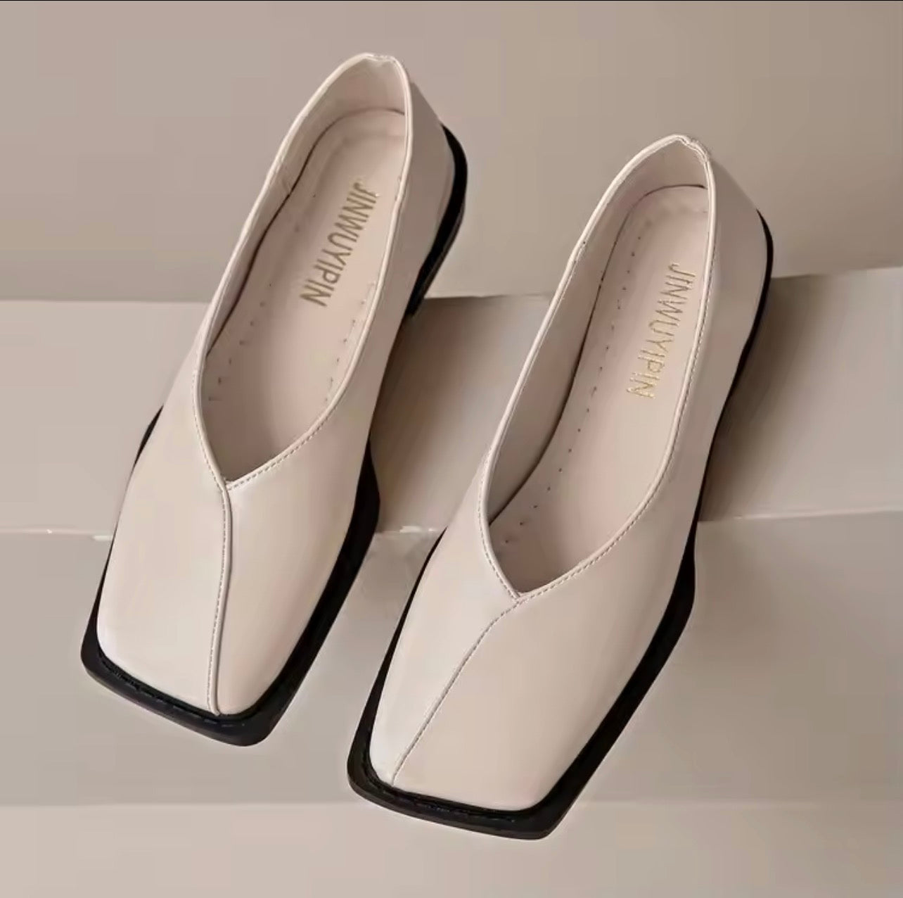 Square toe Mary Jane style shoes
