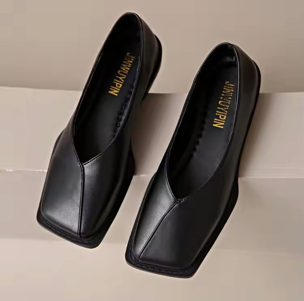 Square toe Mary Jane style shoes